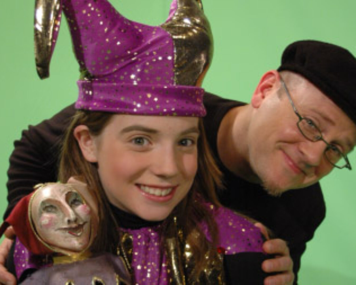 The Cast of Spellz in front of a green screen on set.